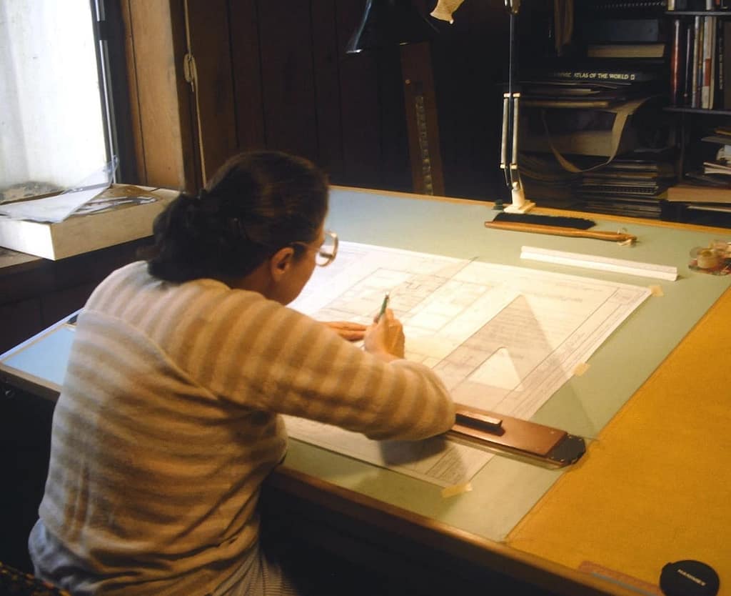 photo of Monika at her drafting table in 1986