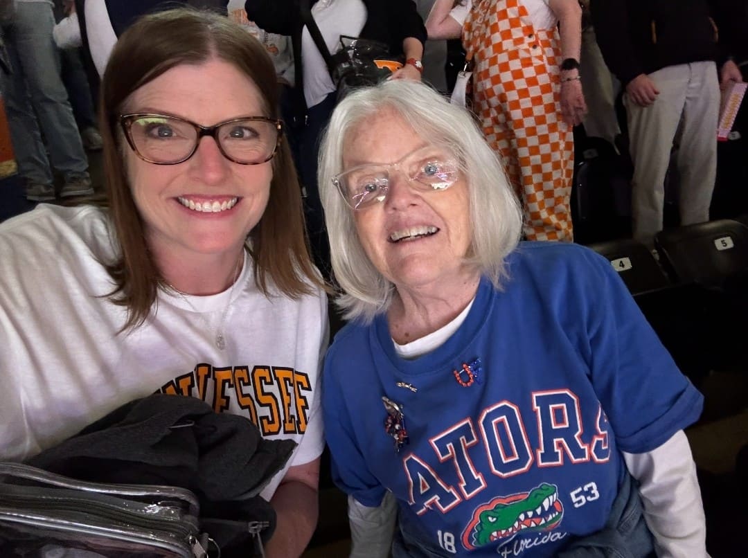 Photo of Suzanne and Elizabeth at the basketball game