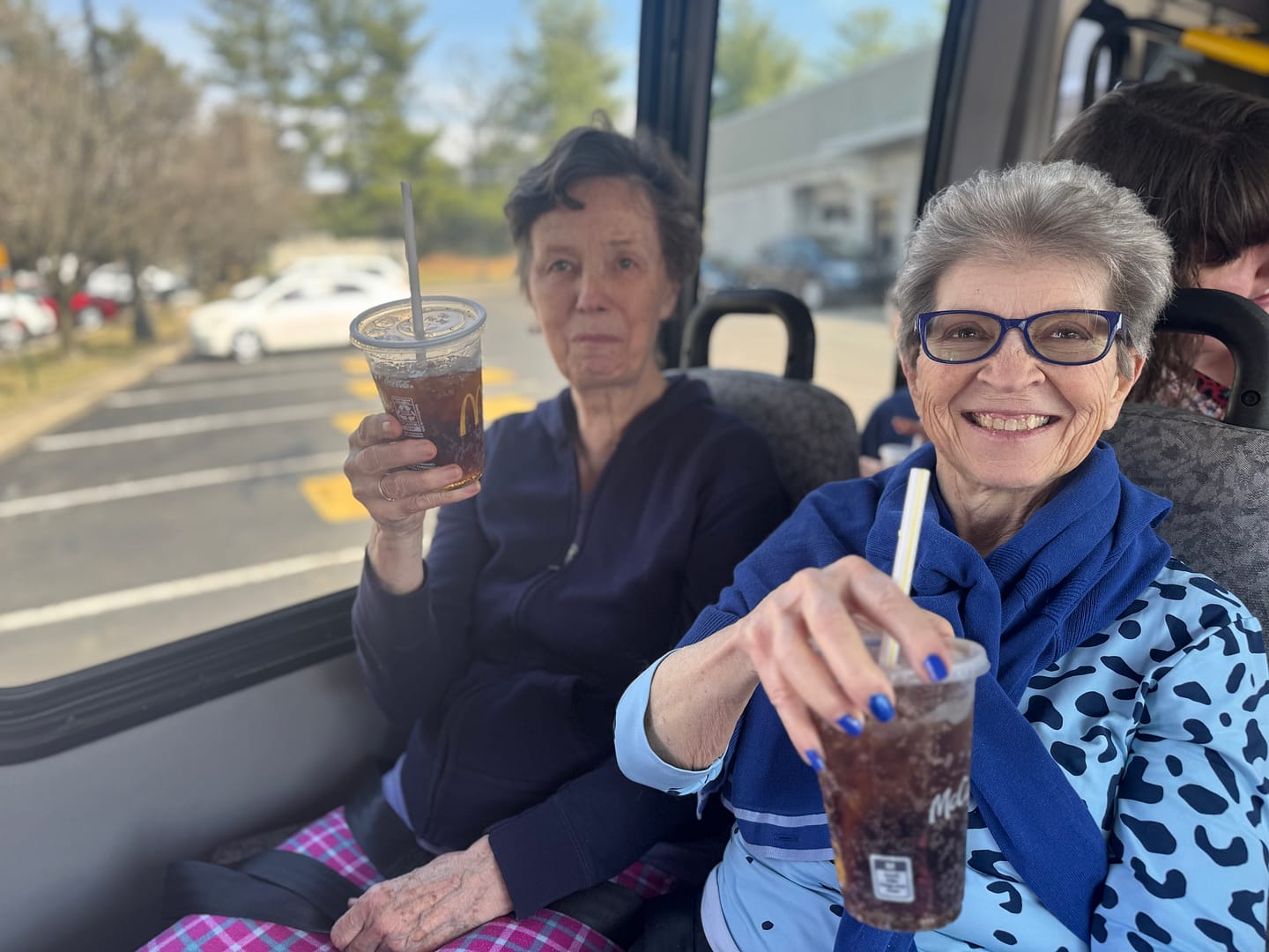 photo of memory care residents with tea