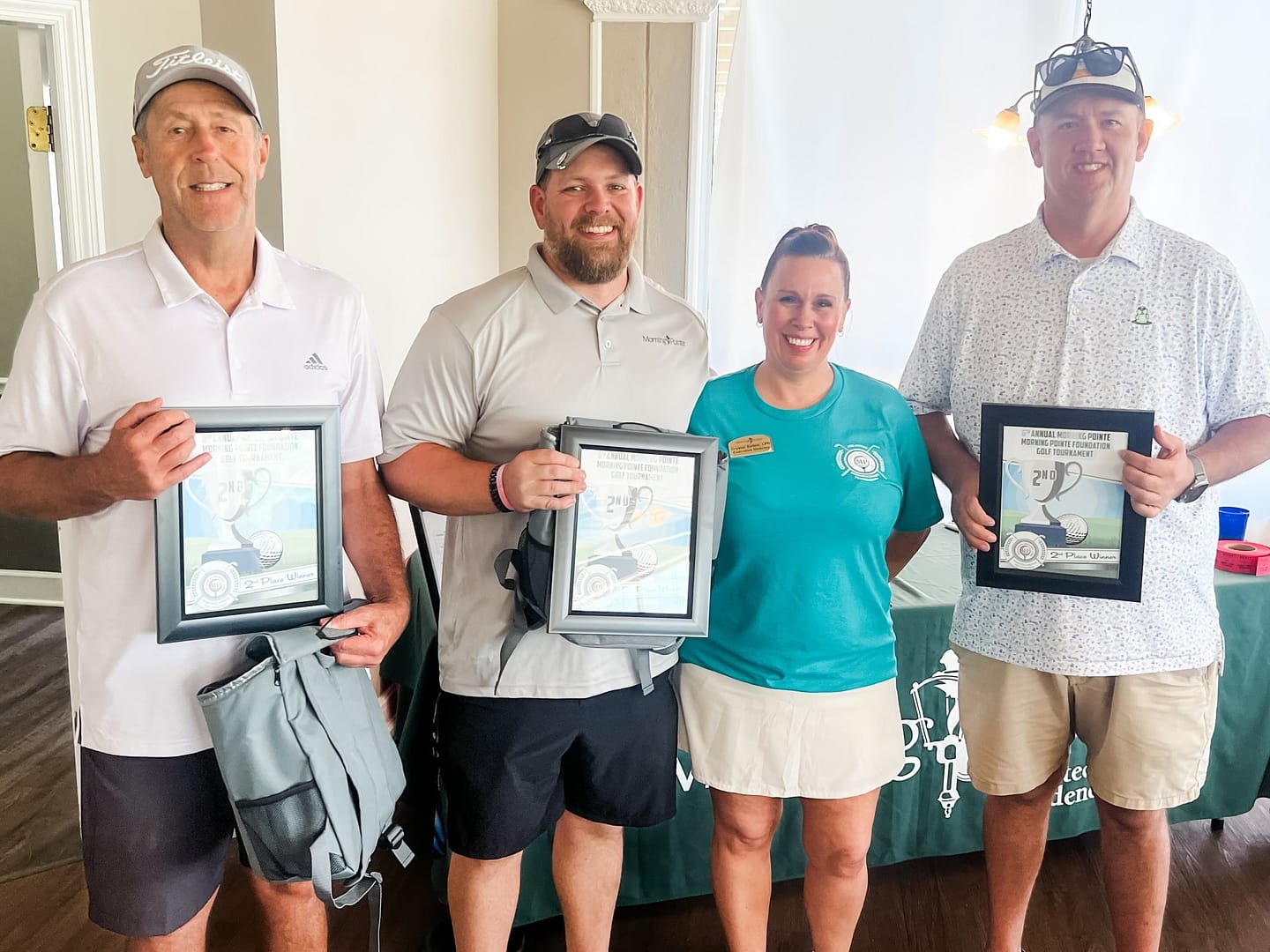 photo: Crystal Sutton, executive director at Morning Pointe of Athens, center, with 2024's second-place winners from Sweetwater Hospital, left to right: Terry Knight, Cory Sutton, and Chris McKonkey