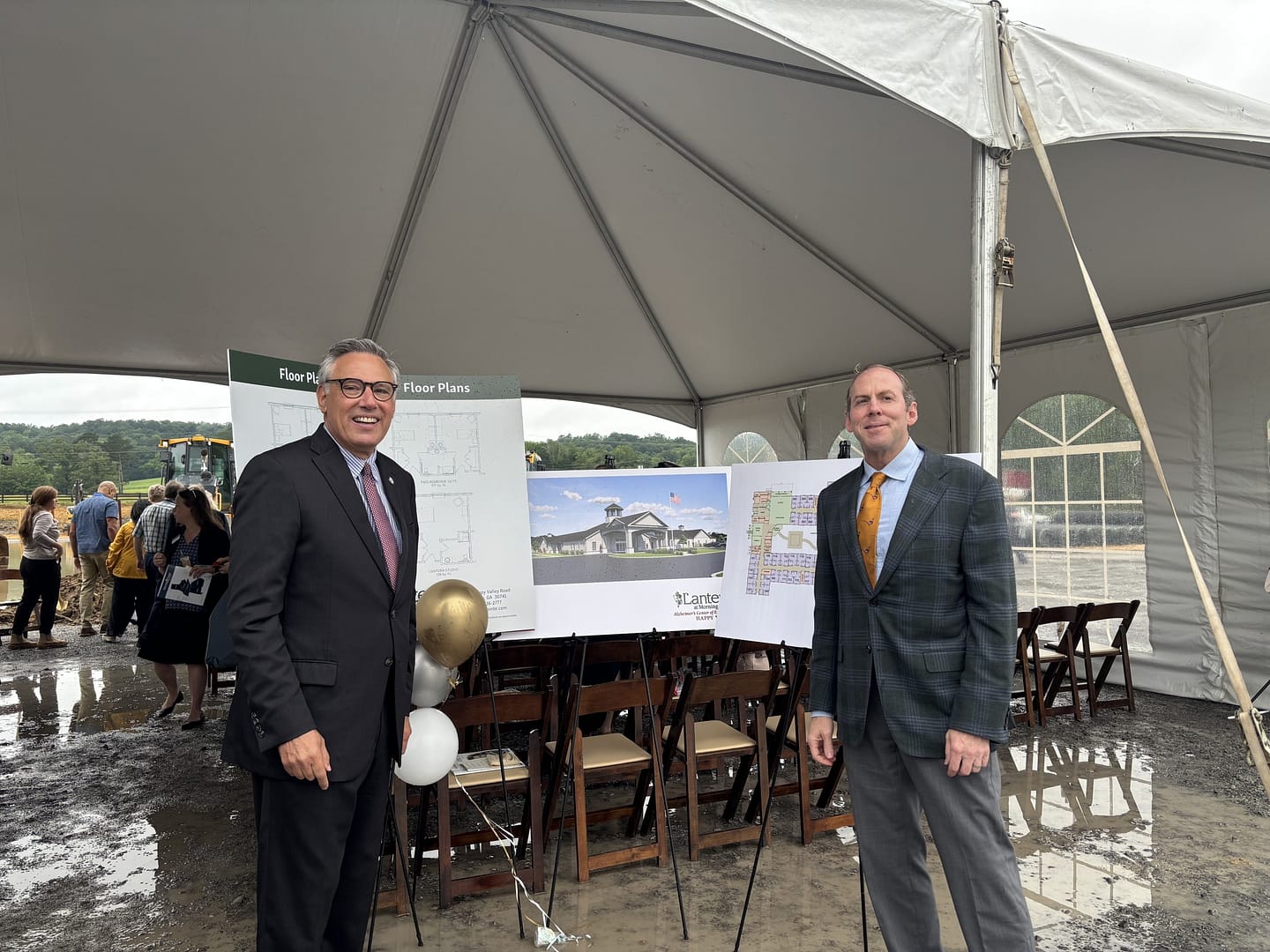photo of Morning Pointe Senior Living Co-Founders Greg A. Vital, President (left), and Franklin Farrow, CEO (right) with plans for The Lantern