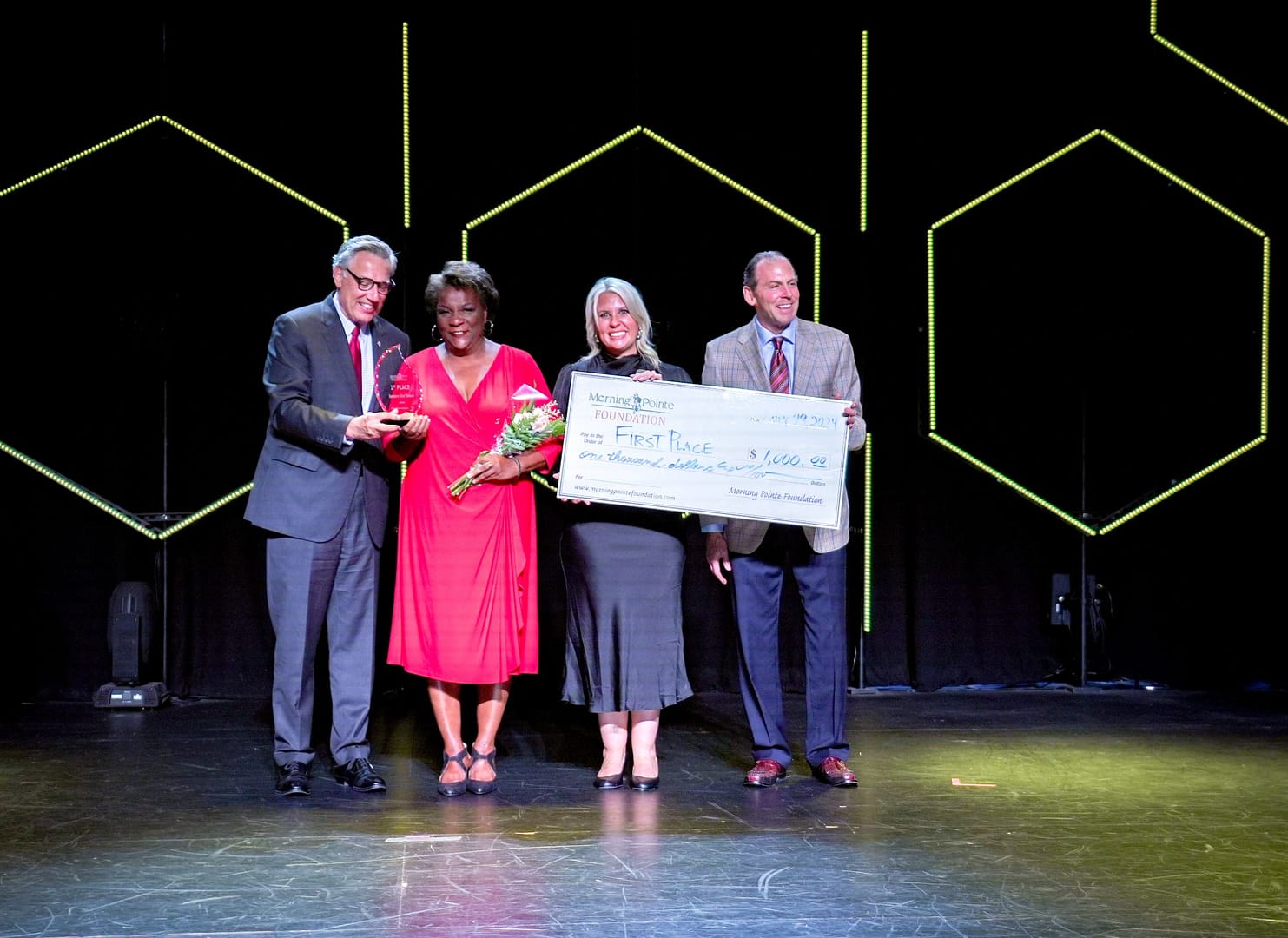 Left to right: Greg A. Vital, Morning Pointe Senior Living Co-Founder and President; Susan Taylor, 1st Place Seniors Got Talent Winner 2024; Miranda Perez, Morning Pointe Foundation Executive Director; and Franklin Farrow, Morning Pointe Senior Living Co-Founder and CEO.