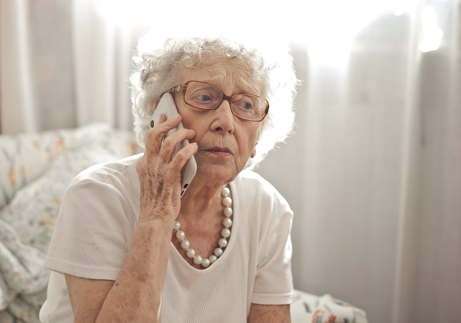 stock photo of senior on the phone