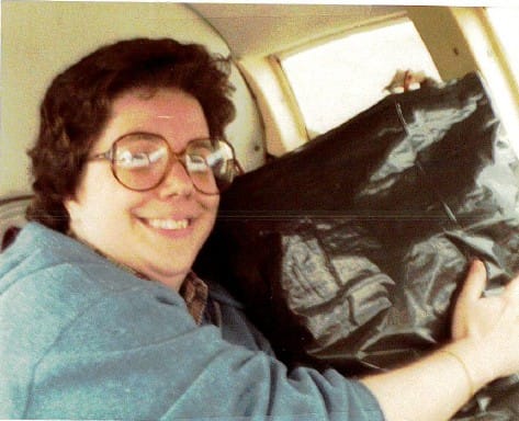 photo of Brenda on an airplane