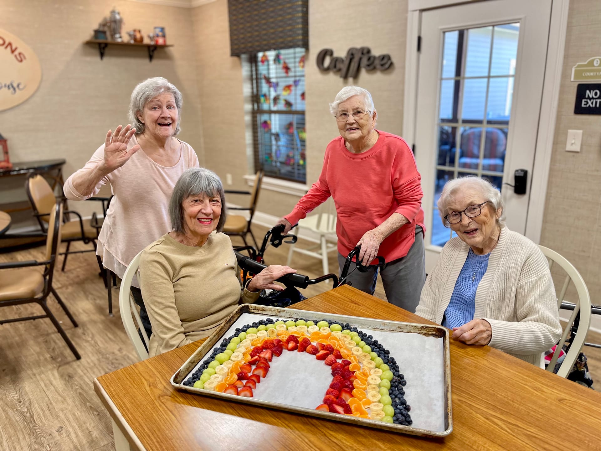 photo of residents with a fruit craft