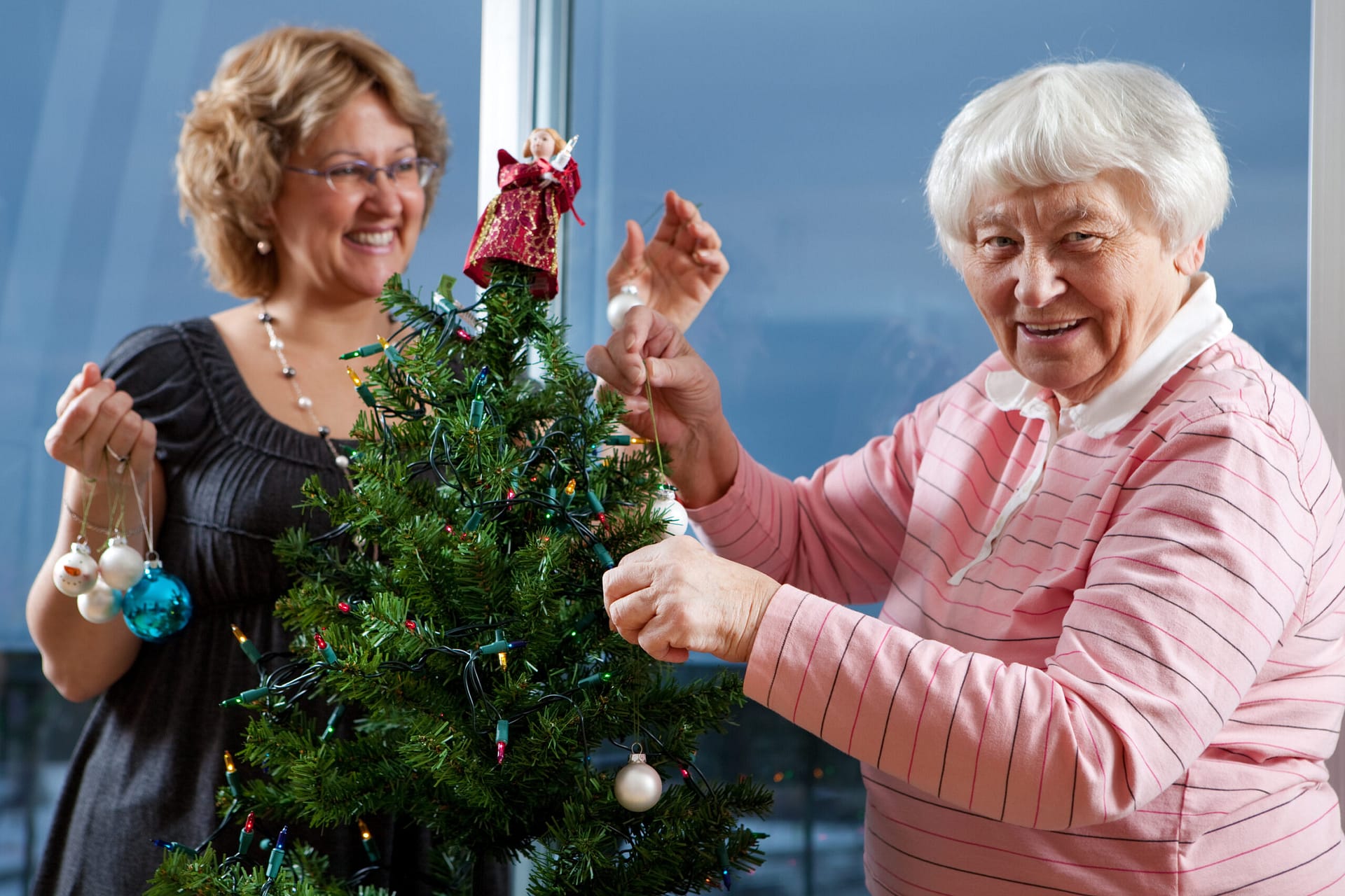 stock photo of tree decorating