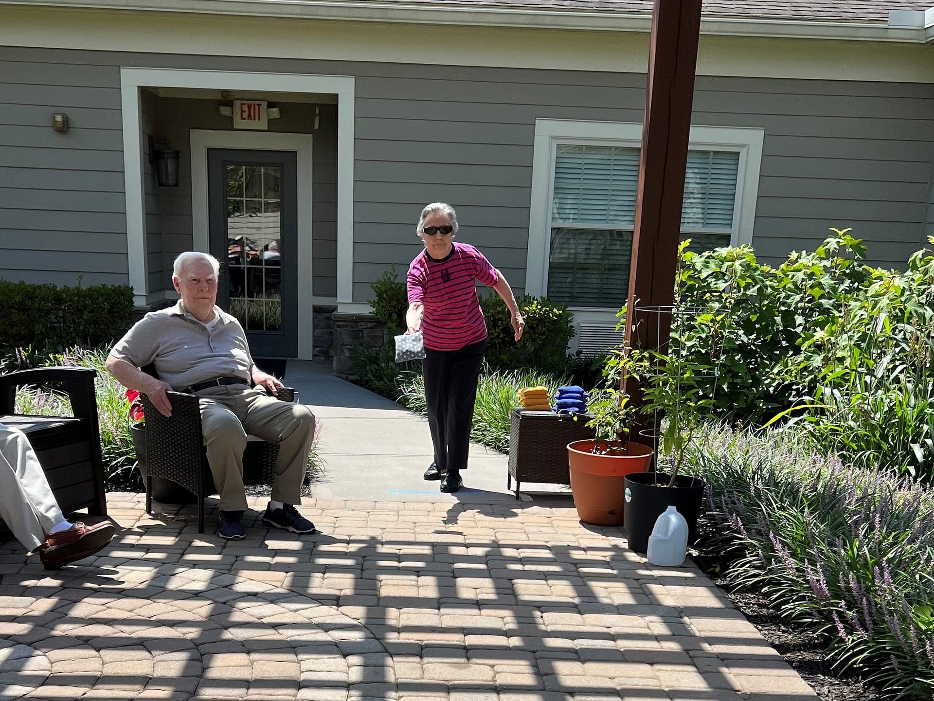 photo of residents at Morning Pointe of Powell practicing cornhole