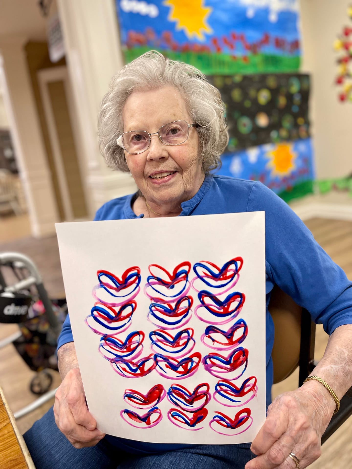 photo of happy Lantern resident with heart collage