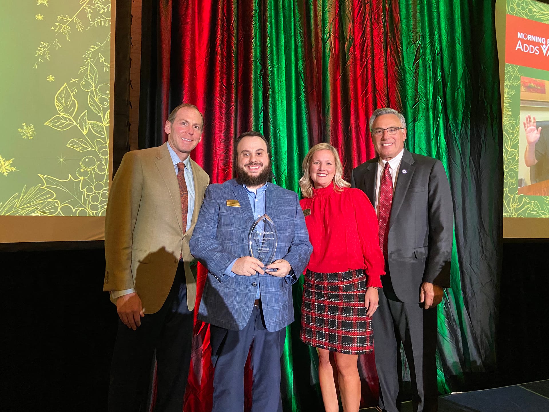 Left to right: Franklin Farrow, Morning Pointe Senior Living Co-Founder and CEO; James Ford, Business Office Director at the Morning Pointe of Lenoir City campus and Exceeding Expectations winner for Business Office; Abby Medley, Vice President of Morning Pointe's Appalachian Region; and Greg A. Vital, Morning Pointe Co-Founder and President