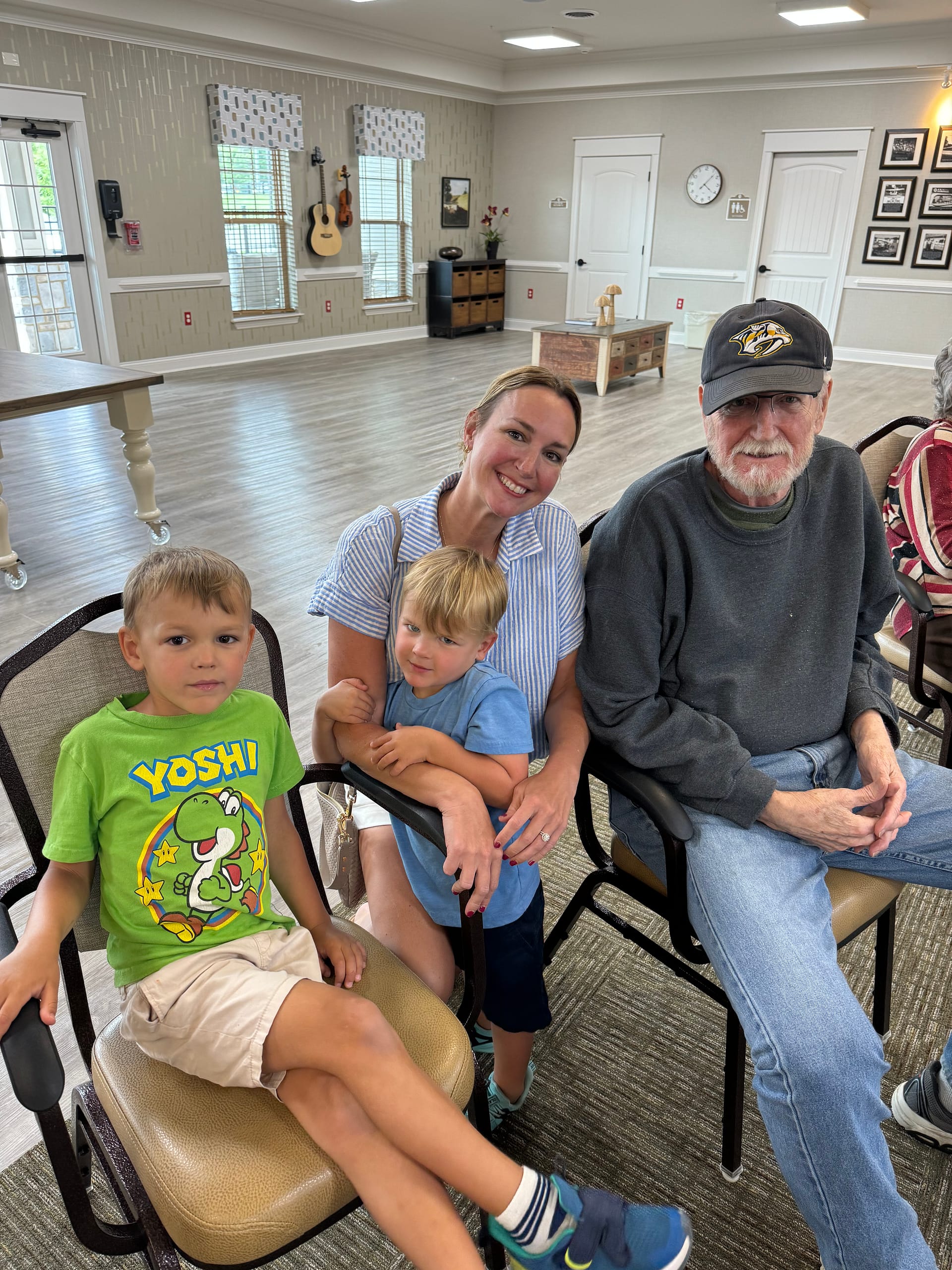 photo of resident Ron Polk celebrating Father’s Day with his daughter, Loni, and her two sons