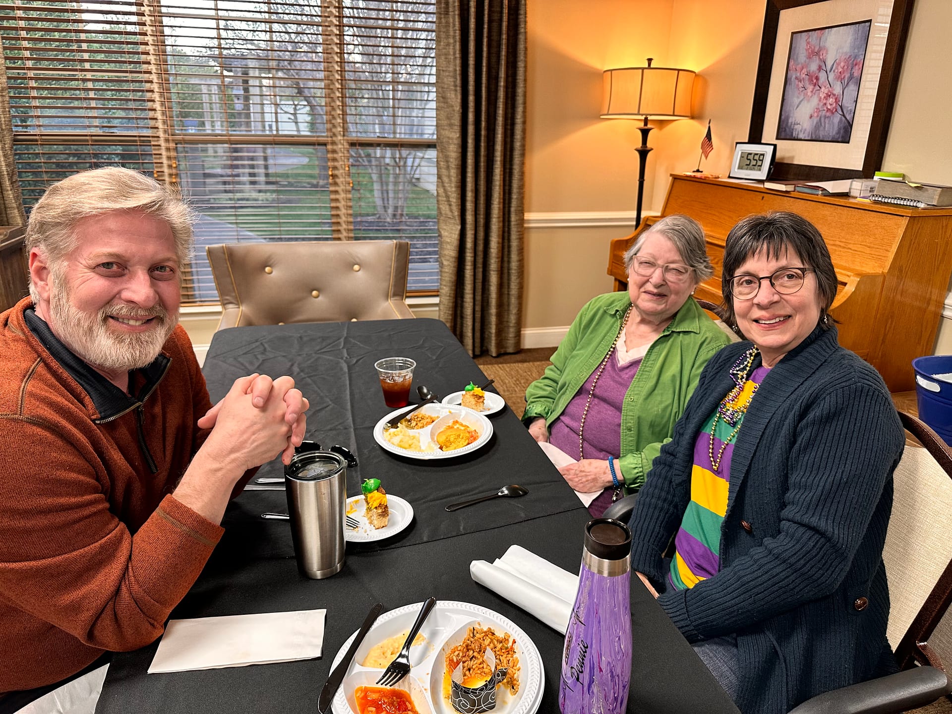 Elaine enjoying Mardi Gras at Morning Pointe of Lenoir City with her son and daughter-in-law