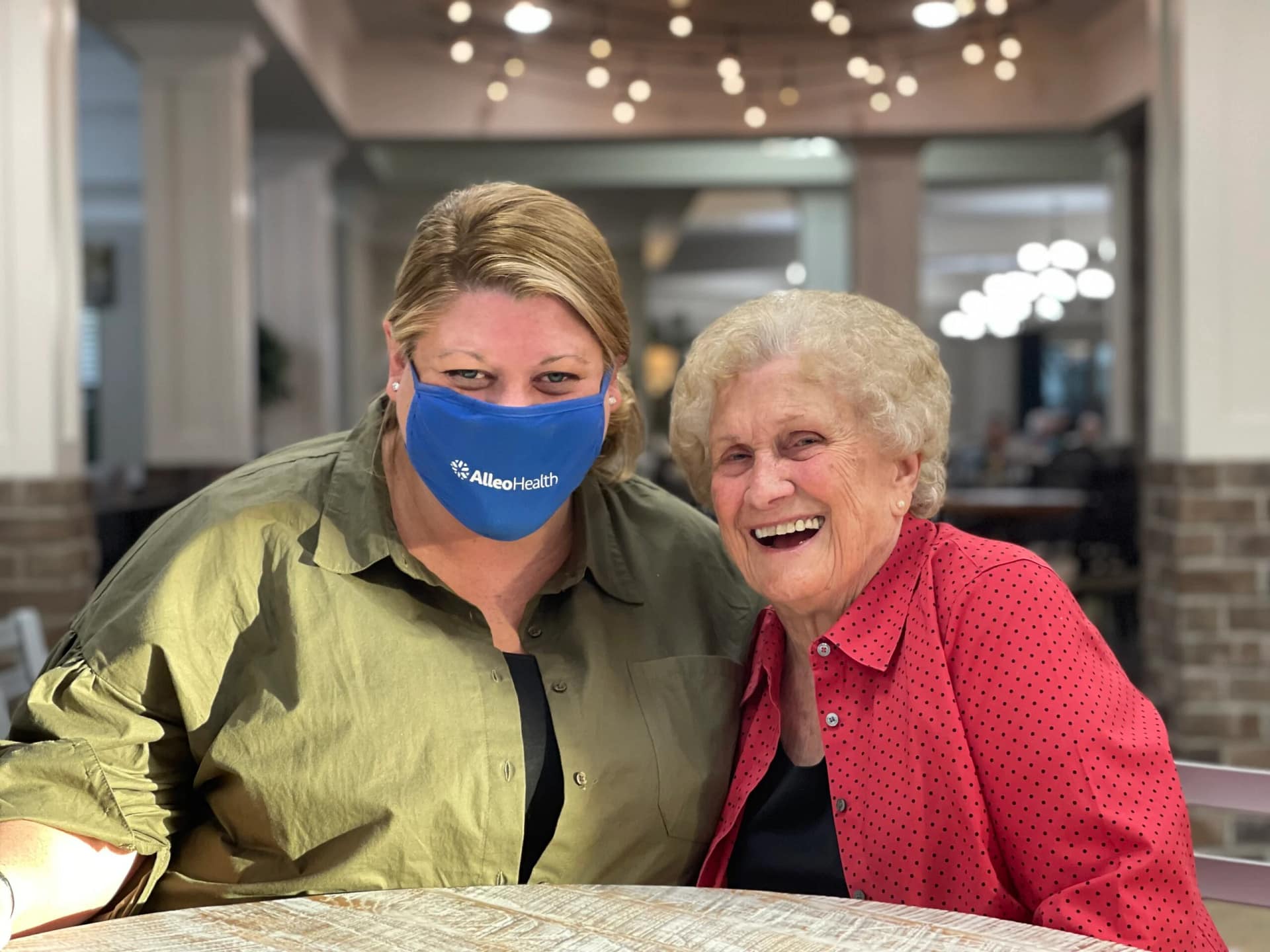 Young woman and senior woman smiling