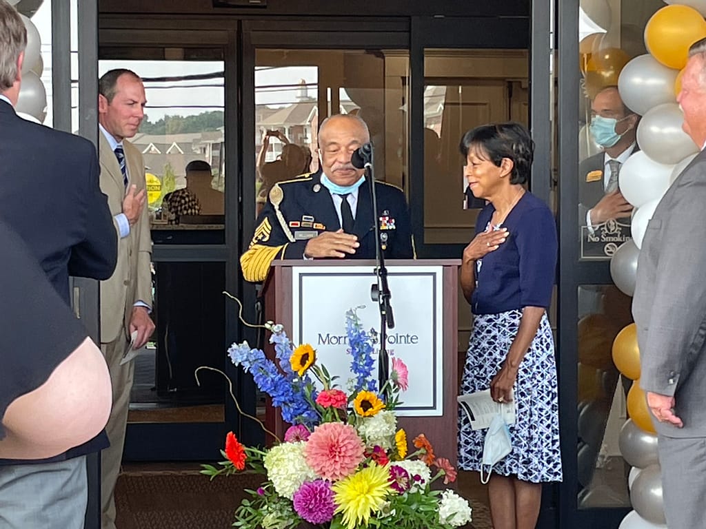 photo of Richard Williams leading the Pledge of Allegiance at the grand re-opening of The Lantern at Morning Pointe of Chattanooga