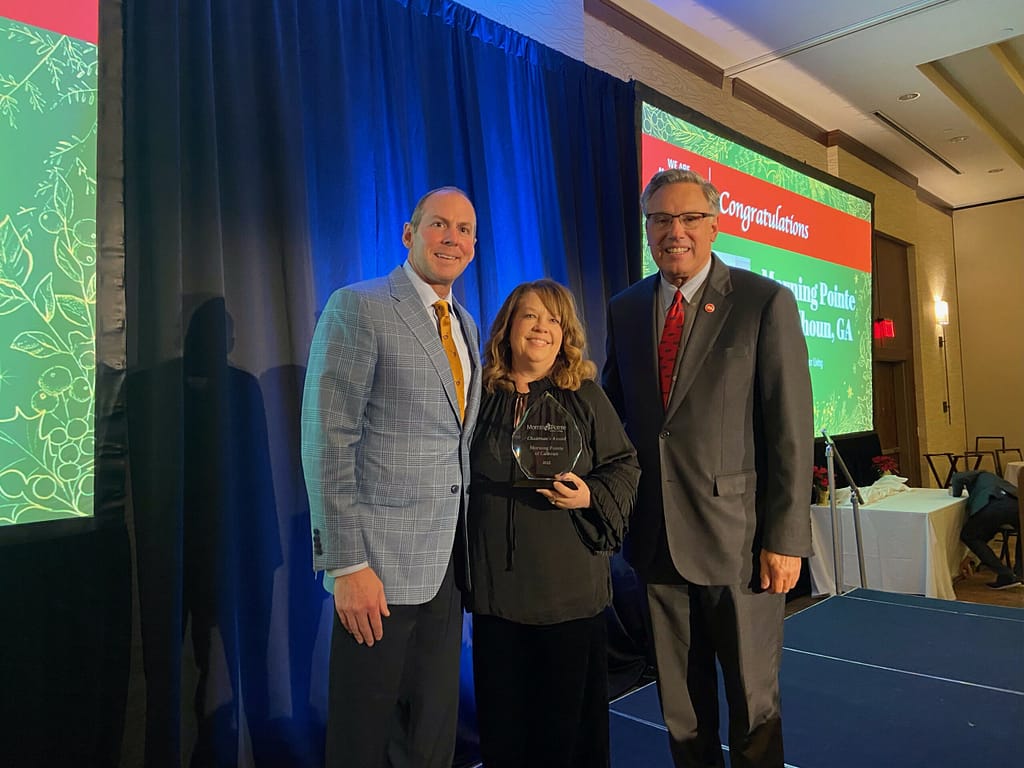 photo of (left to right): Franklin Farrow, Morning Pointe CEO; Traci Clements, Executive Director at Morning Pointe of Calhoun; and Greg A. Vital, Morning Pointe President