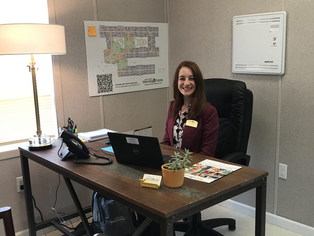 photo of Kristen Weitz, Community Relations Director, in the sales trailer