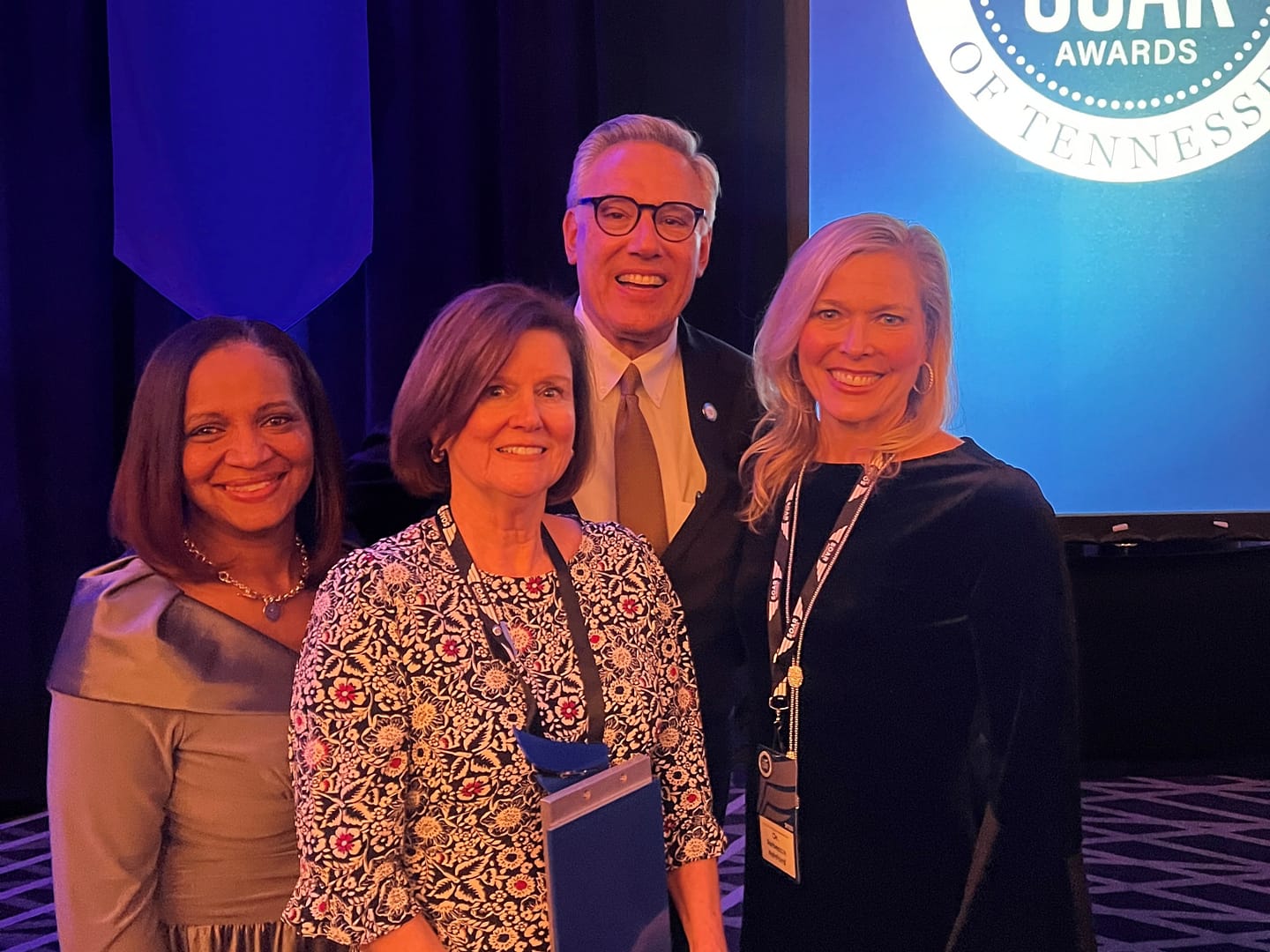 photo of Greg A. Vital, co-founder of the Morning Pointe Foundation; with representatives of Chattanooga State Community College (left to right) Martina Harris, Dean of Allied Health; Dr. Caroline Rogers, physical therapist assistant instructor; and Dr. Rebecca Ashford, president