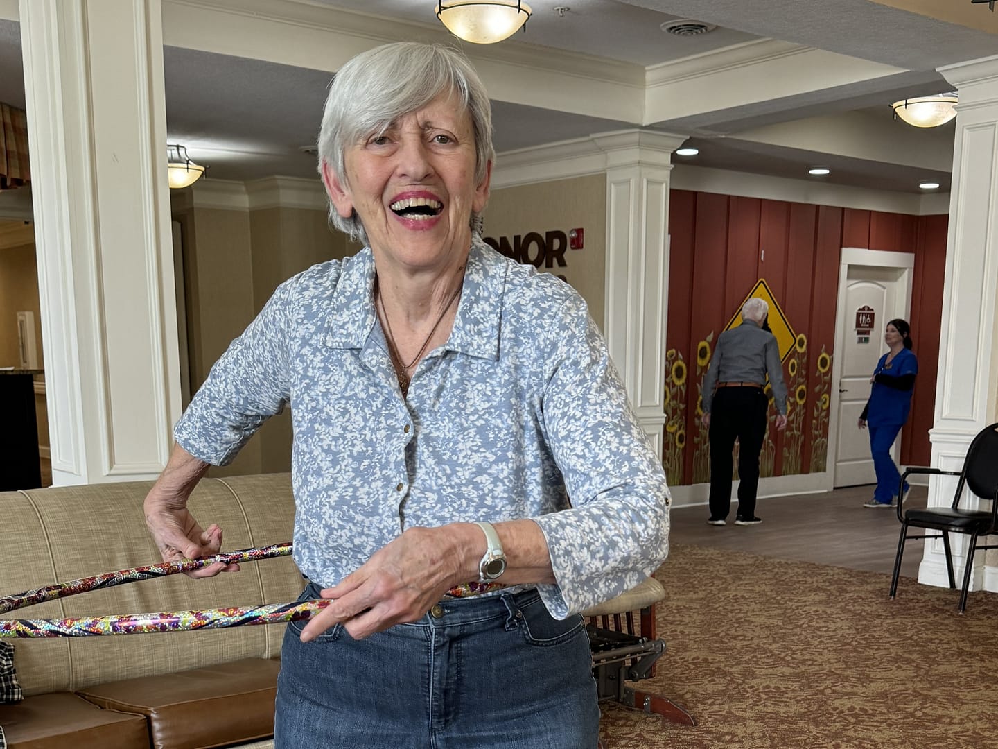 photo of memory care resident hula hooping