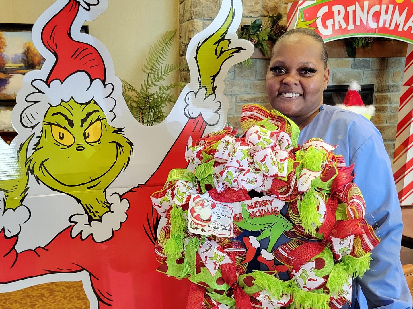 Resident Assistant Shay with one of the wreaths