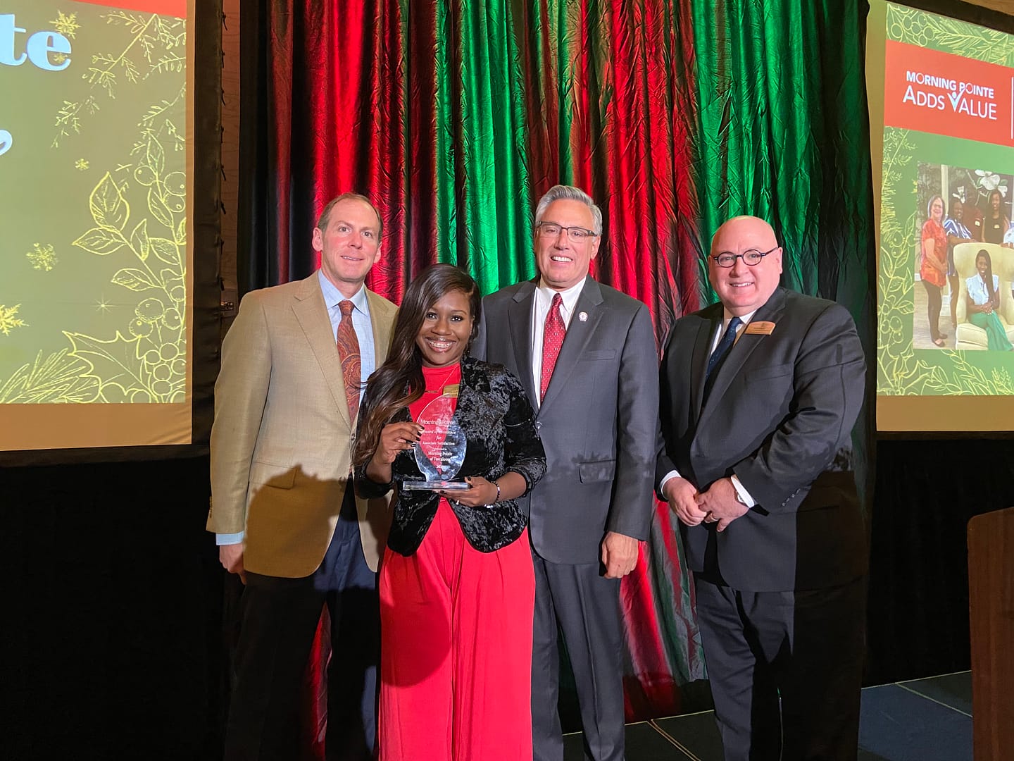 Left to right: Franklin Farrow, Morning Pointe Senior Living Co-Founder and CEO; Kendra Martin, Executive Director of Morning Pointe of Tullahoma, winner of the Associate Satisfaction Award; Greg A. Vital, Morning Pointe Senior Living Co-Founder and President; and Scott Edens, Morning Pointe Senior Living VP of Professional Development