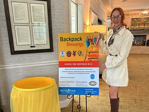 photo of Kristen Weitz with the Backpack Blessings barrel at Morning Pointe at Happy Valley