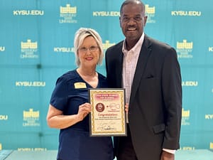 photo of Drema Banta, LPN, with newspaper publisher Kevin Austin