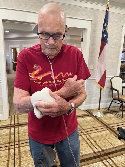 photo of Tom with a bald python from the Chattanooga Zoo