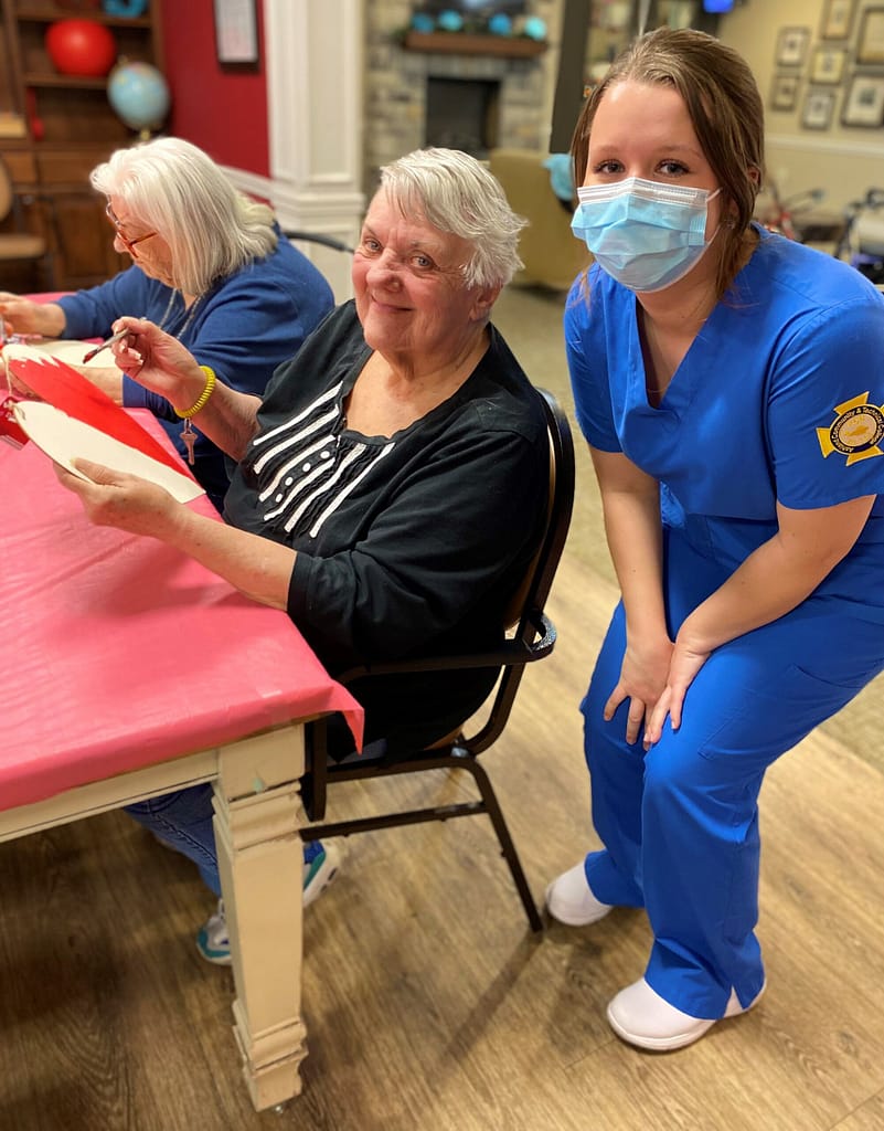 Photo of resident Jeannie Bennet with one of the students