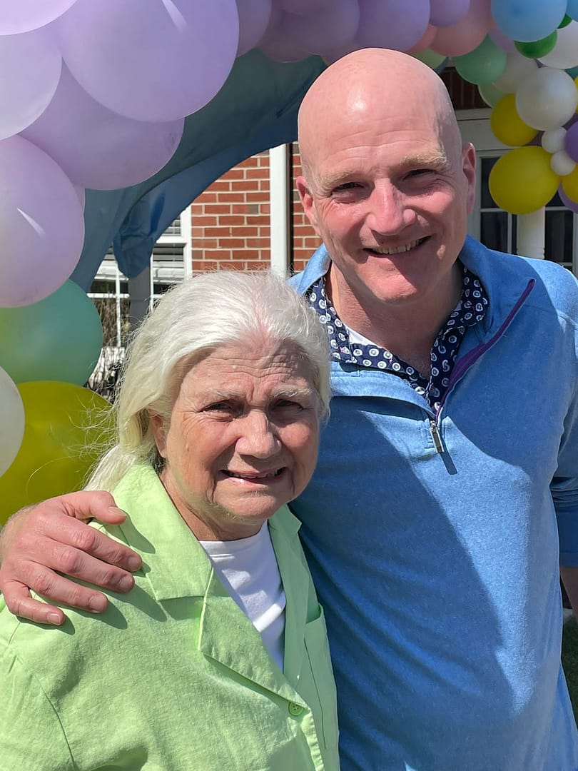 photo of Carolyn with her son, Joe