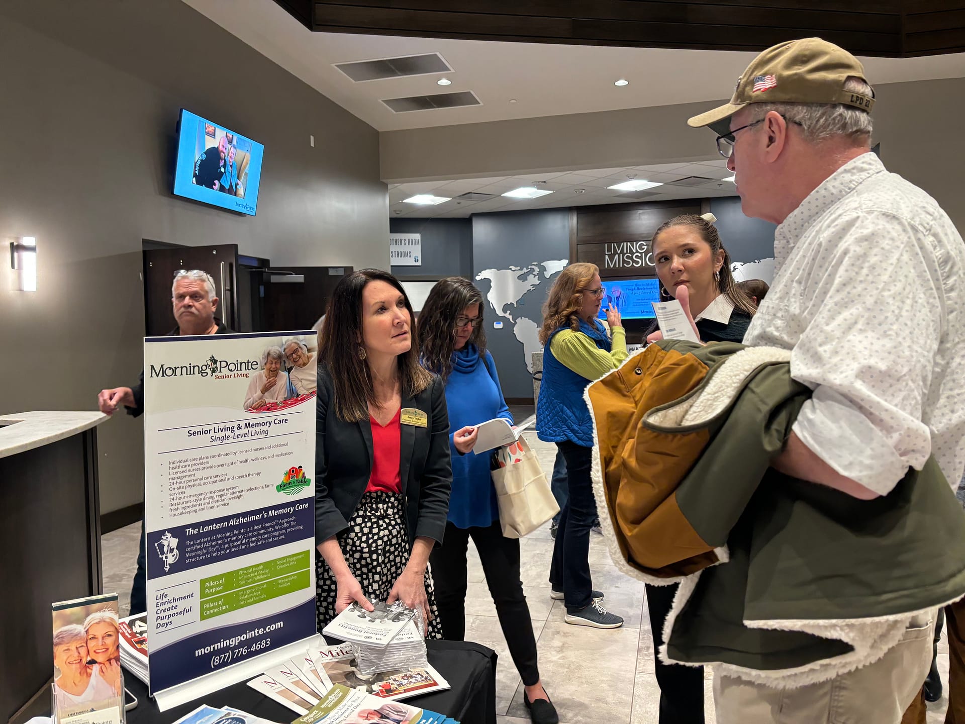 photo of guests and Morning Pointe representatives visiting after the Caregiver Café session