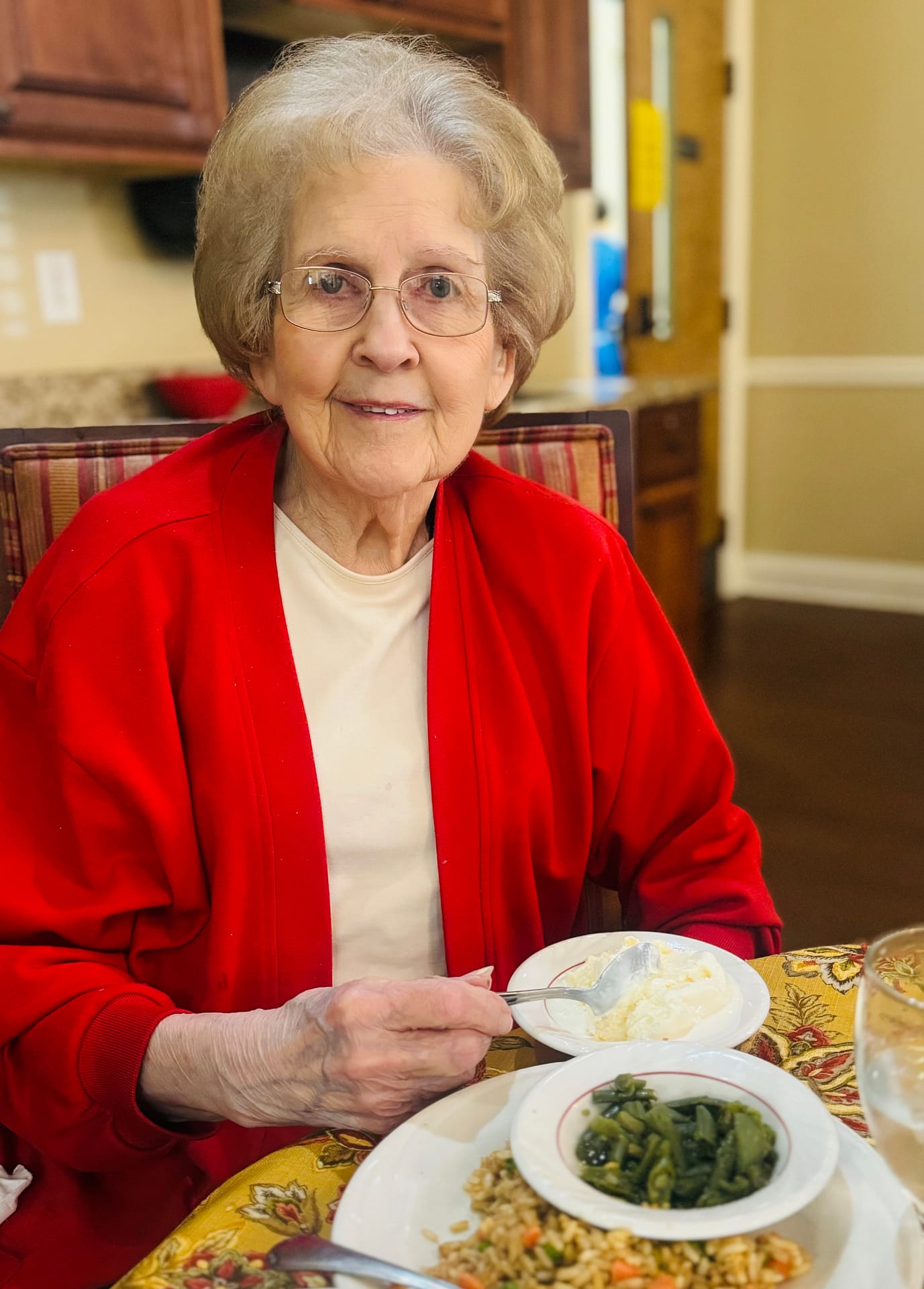 photo of a resident enjoying a delicious meal