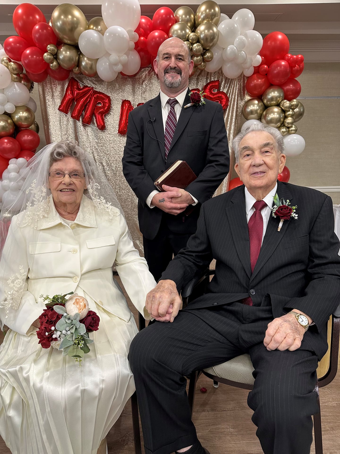 photo of Minister Bryan Boyer with Gene and Joan Jeffrey 