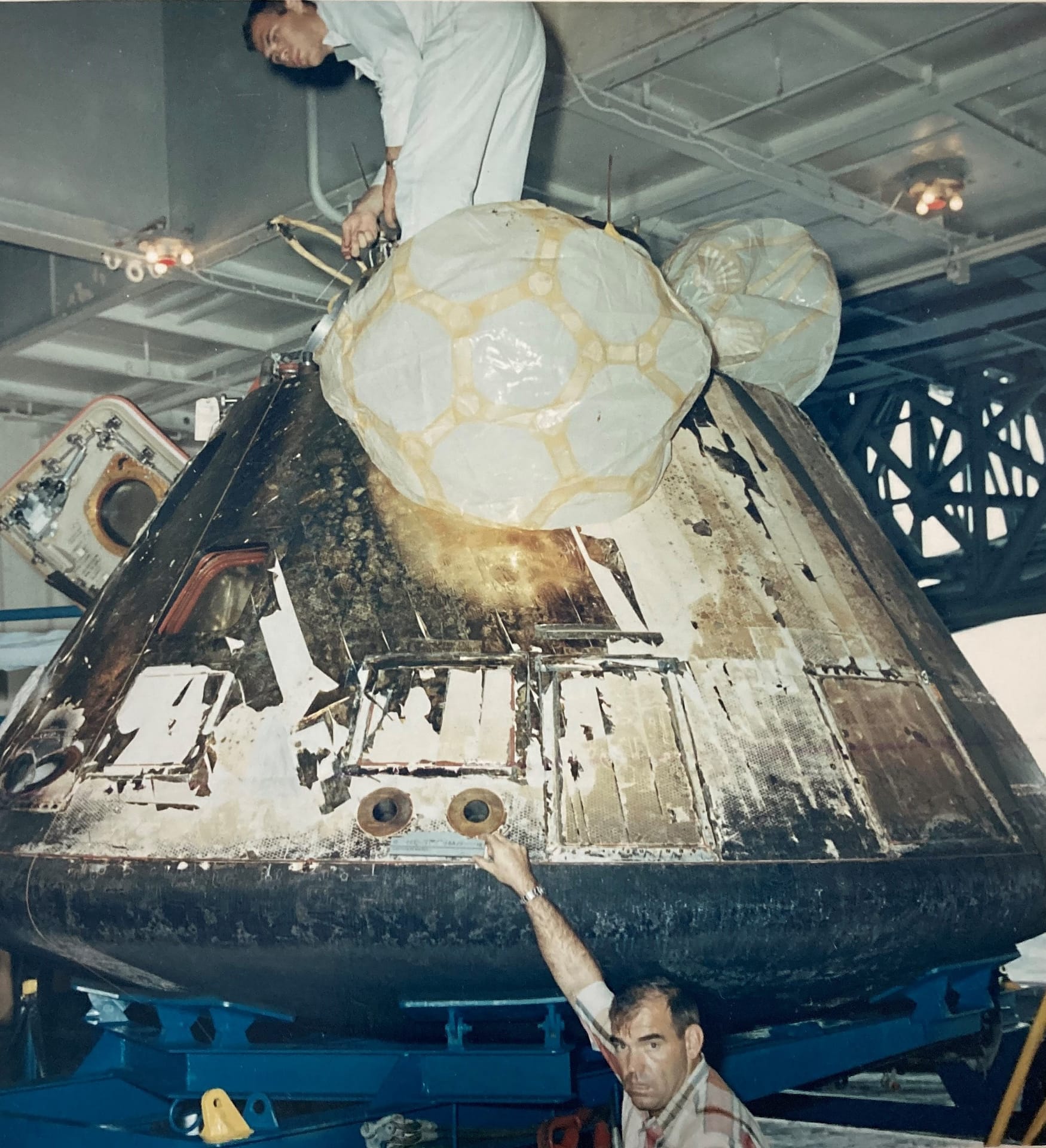 photo of a recovered Apollo capsule (John not pictured)