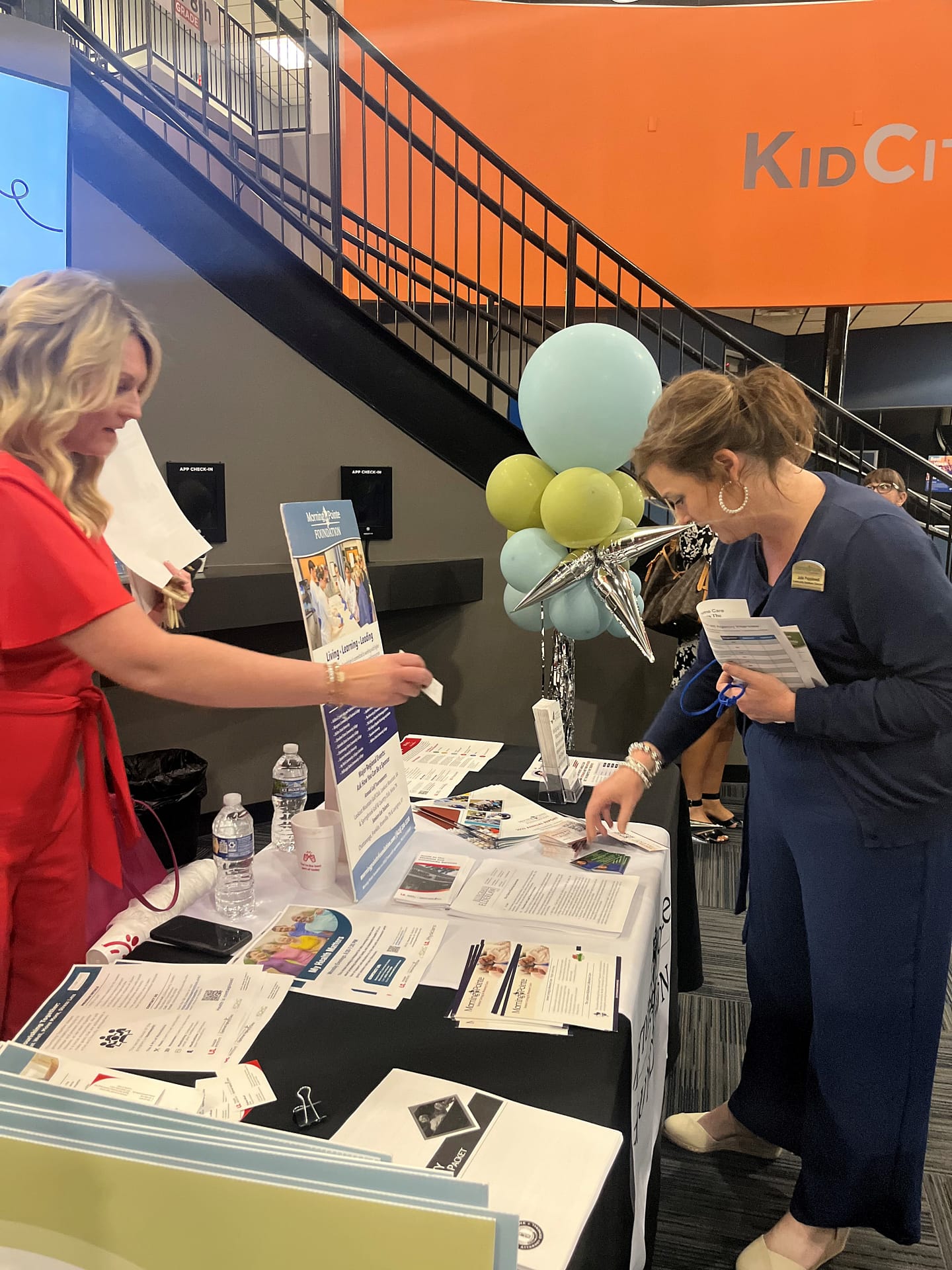photo of guests stopping by the resource table