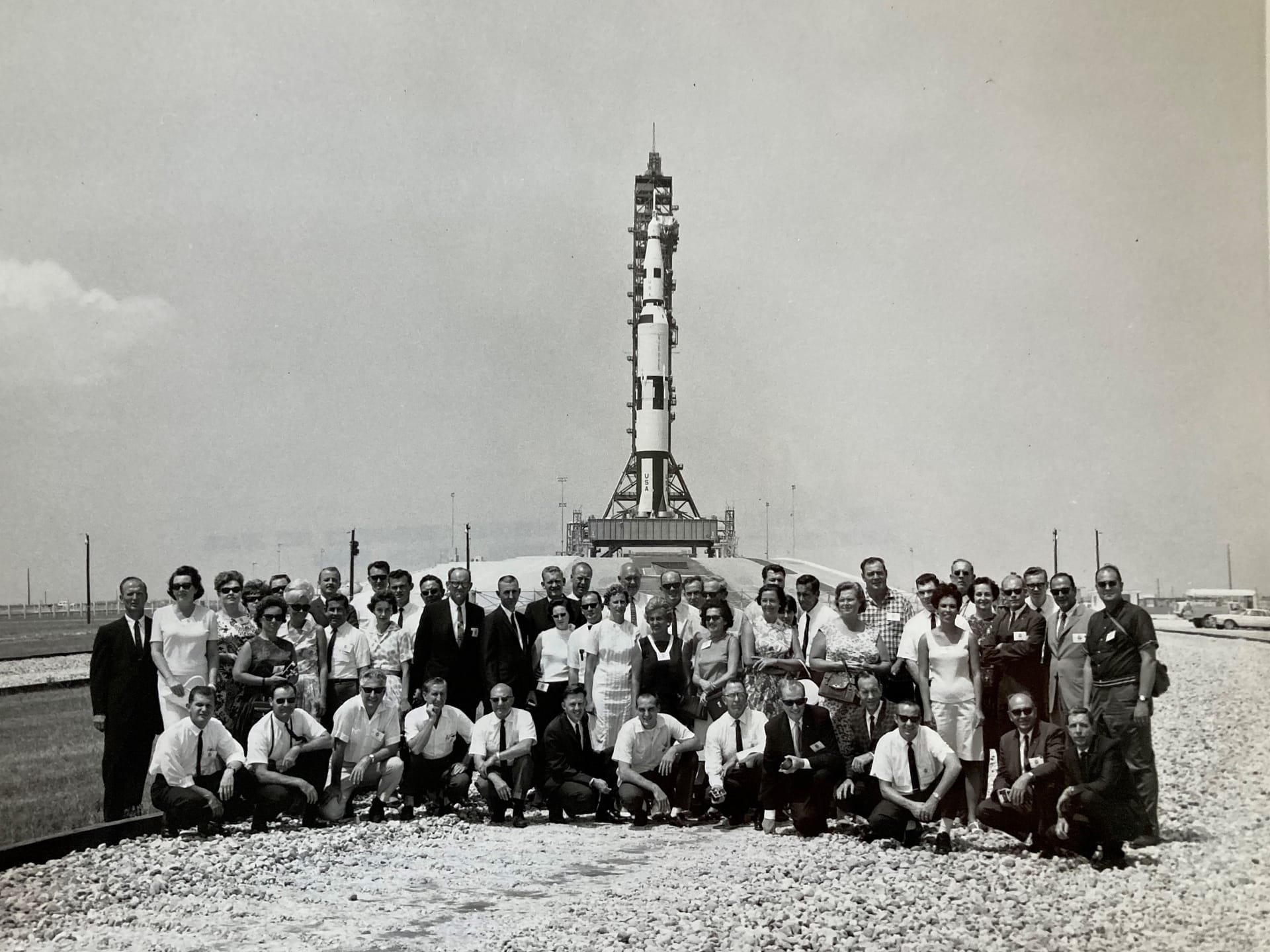 photo of Members of the Apollo 17 support team with John front and center