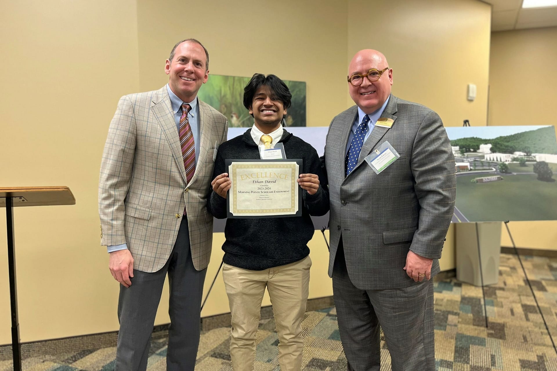 photo, left to right: Franklin Farrow, Morning Pointe Senior Living Co-Founder and CEO; Ethan David, scholarship recipient; and Scott Edens, Morning Pointe VP of Professional Development