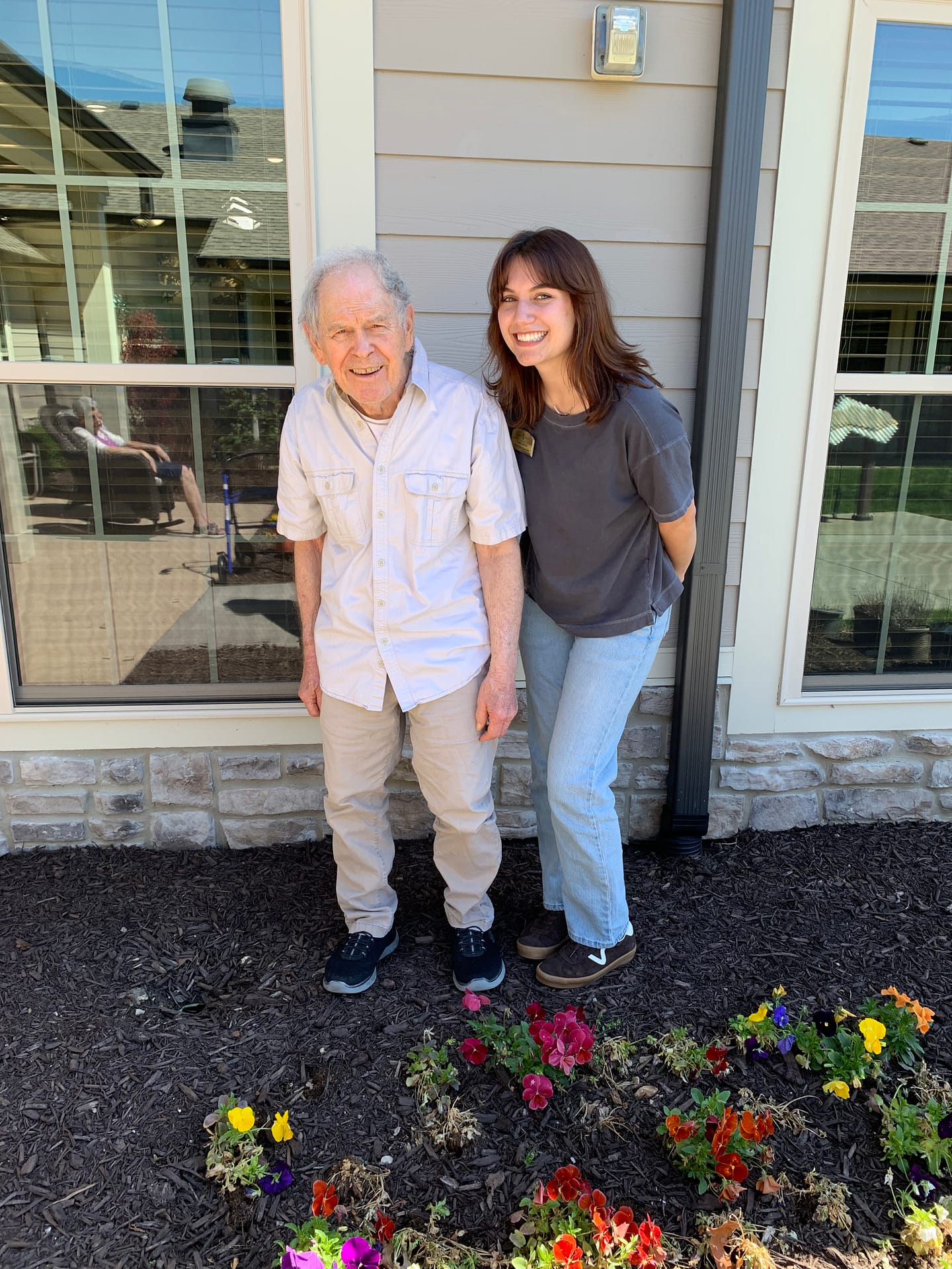 photo of resident and associate from The Lantern at Morning Pointe of Chattanooga in the garden