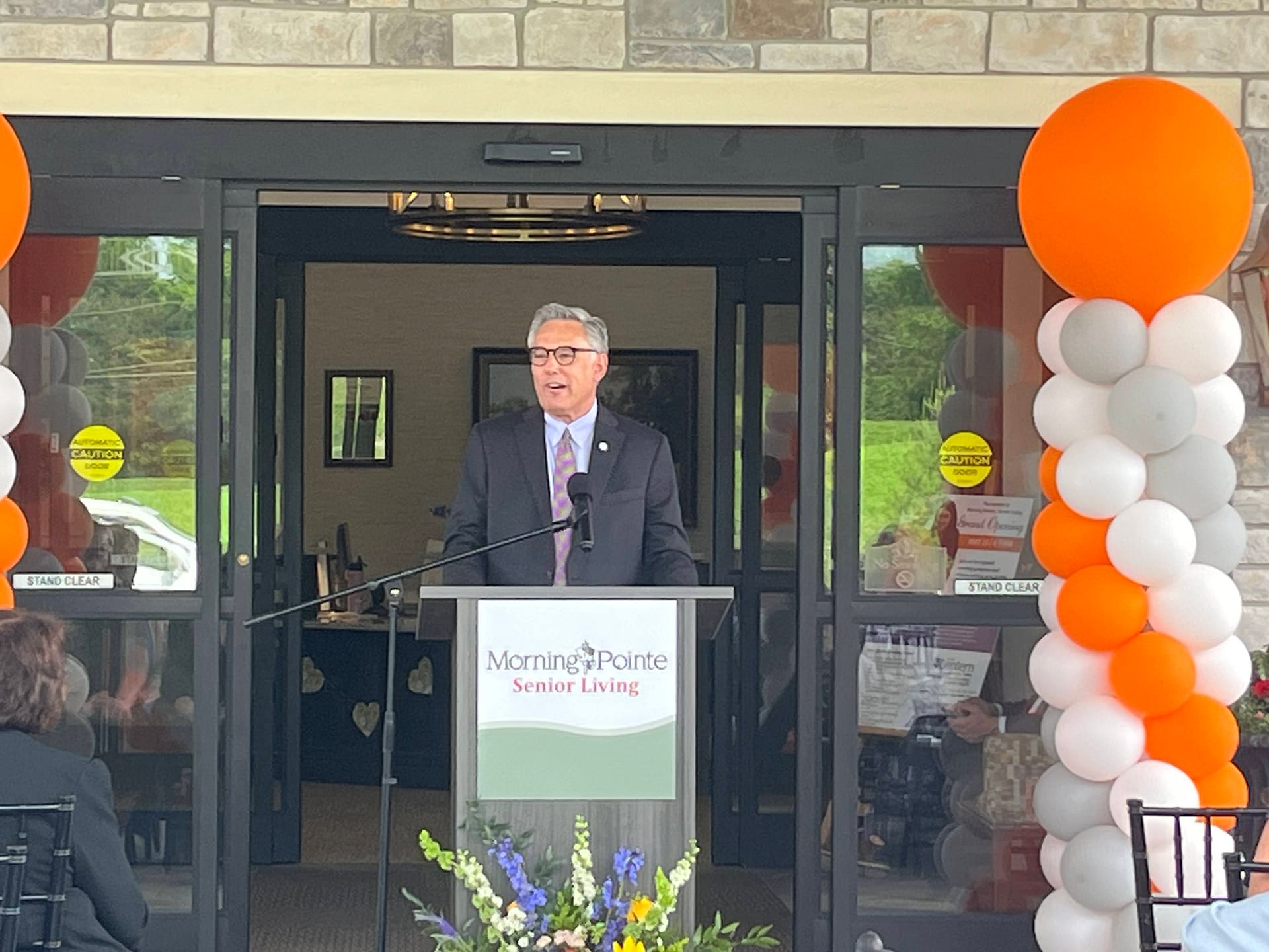 photo of Greg A. Vital, Morning Pointe Senior Living co-founder and president, speaking