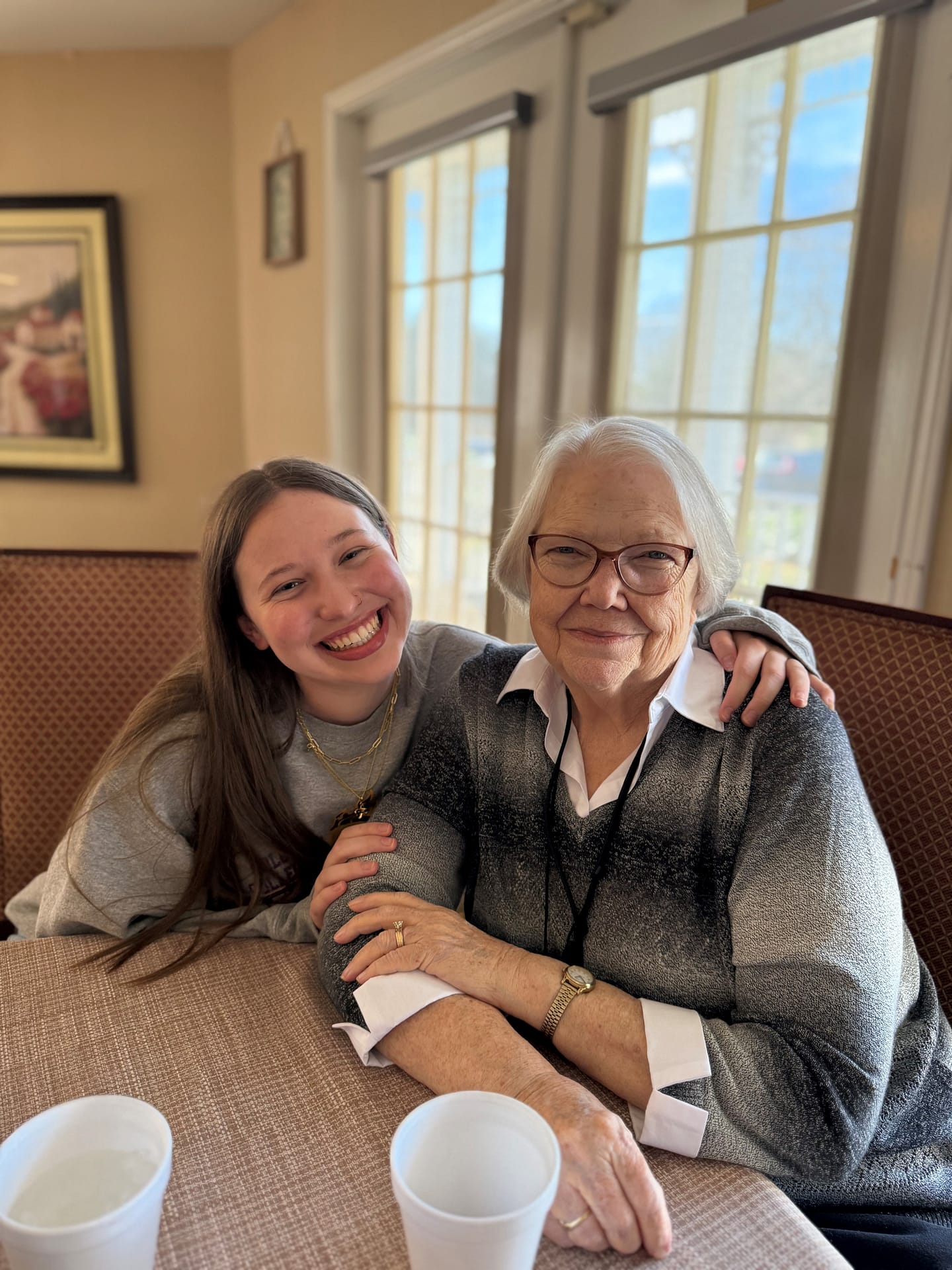 photo of a Morning Pointe resident with a volunteer