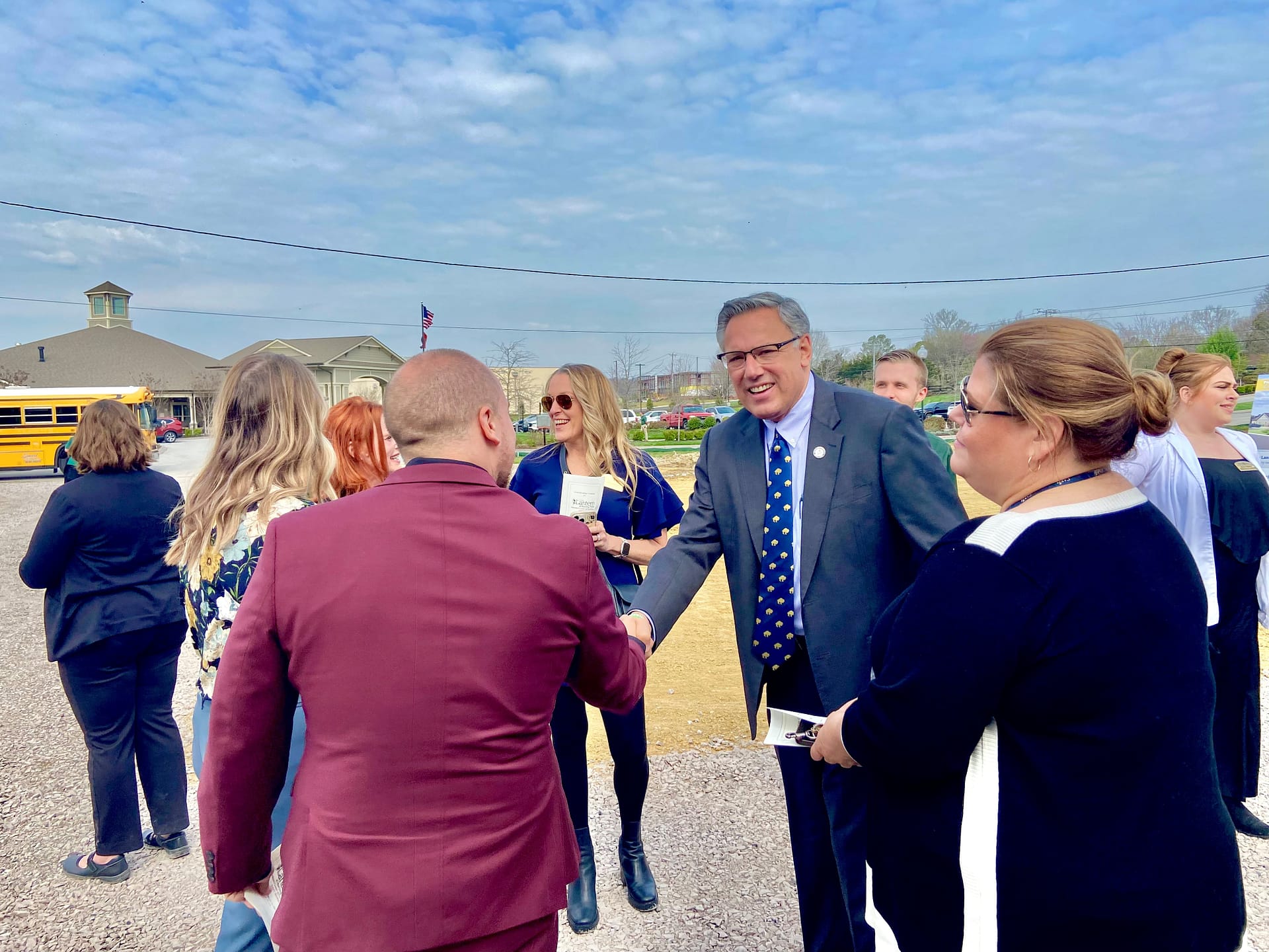 photo of Greg A. Vital, Morning Pointe Senior Living Co-Founder and President, visiting with guests