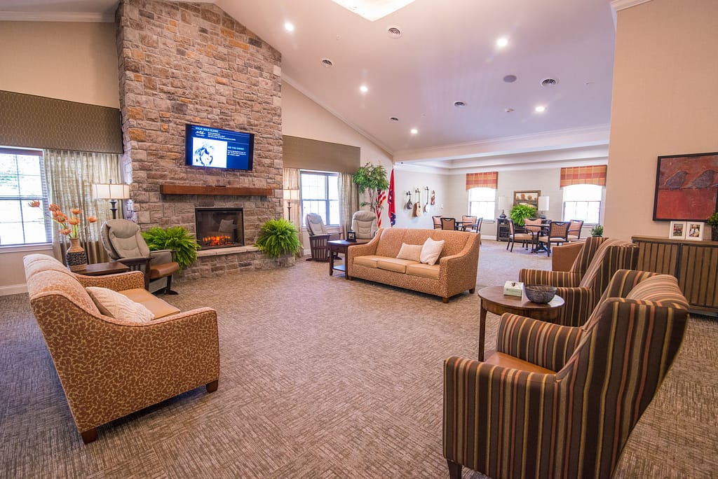 Franklin lantern campus sitting area with fireplace and tv