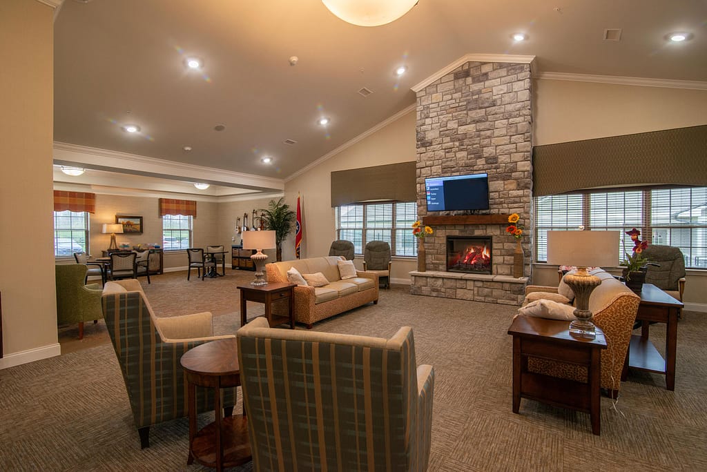 Spring Hill Lantern campus living room with tv and fireplace