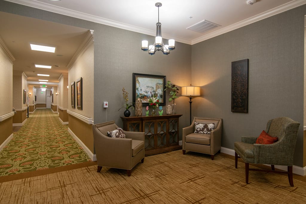 East Hamilton campus hallway with sitting area