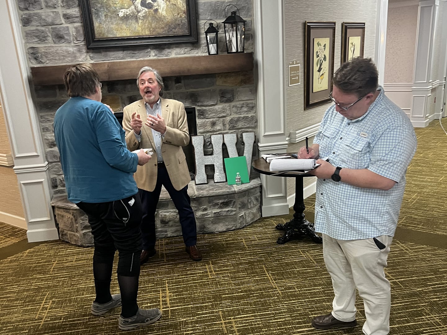 photo of guests talking to a panelist at the 2025 Caregiver Cafe at Morning Pointe of Hardin Valley, TN