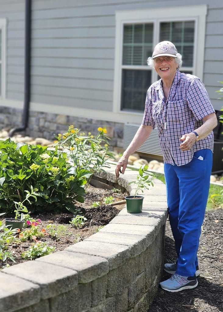 photo of Monika gardening at Morning Pointe of Knoxville