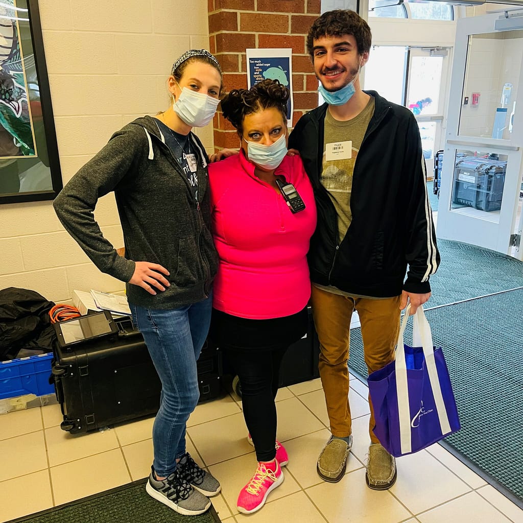 photo of Robin with fellow volunteers at another RAM clinic