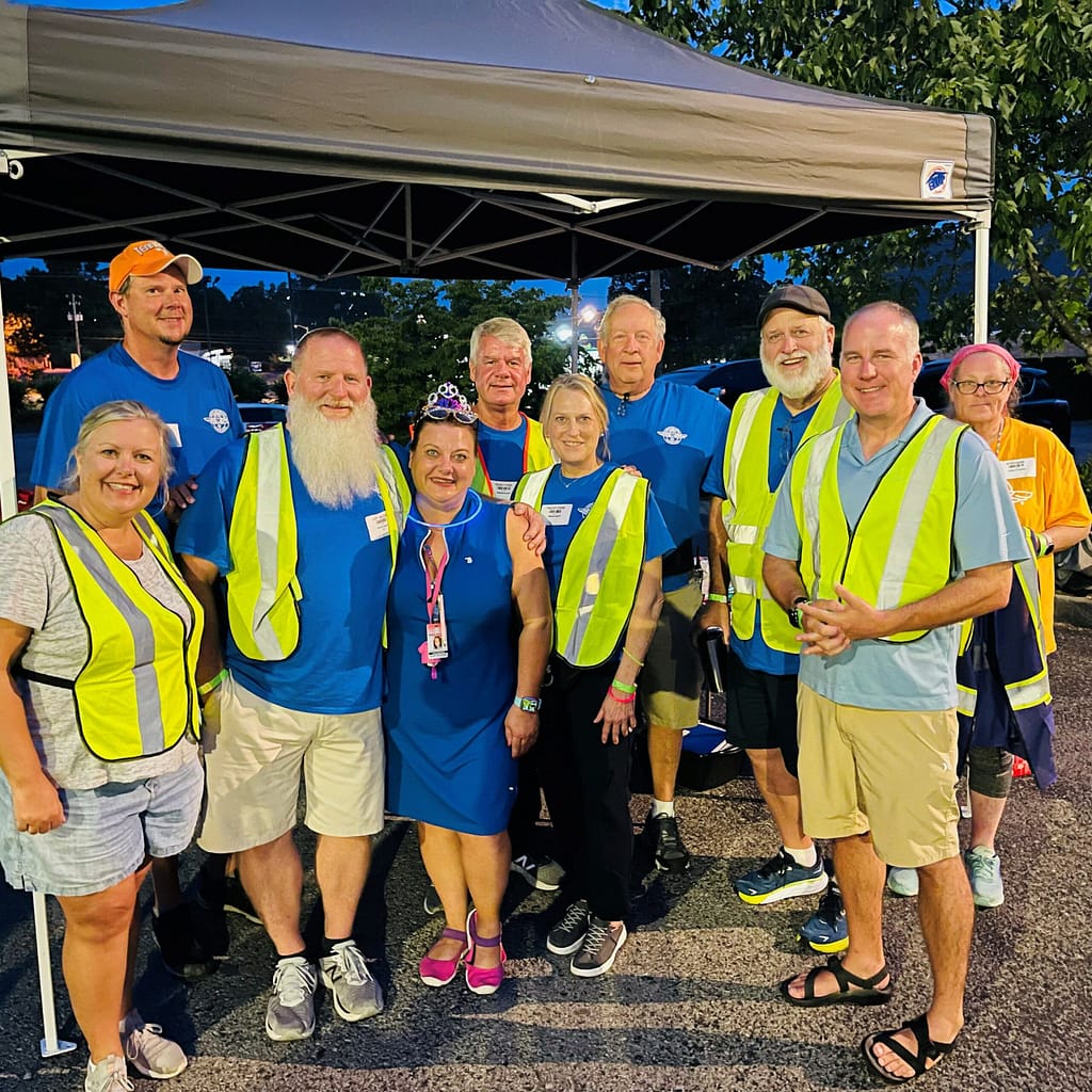 Photo of Robin with fellow RAM volunteers