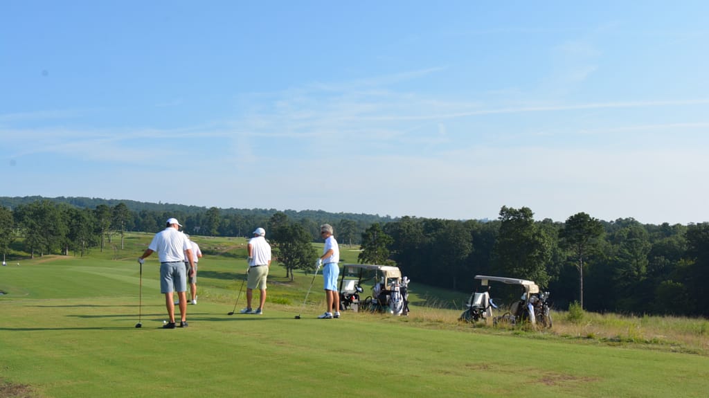 photo of golfers at the tournament