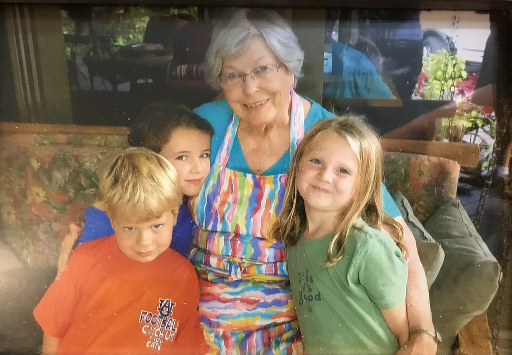 Kathleen with some of the neighbor children she taught 