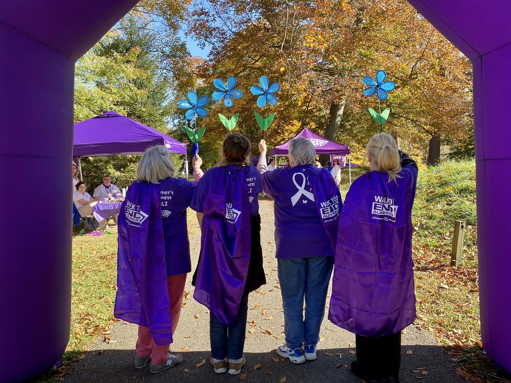 Russell team members with their capes