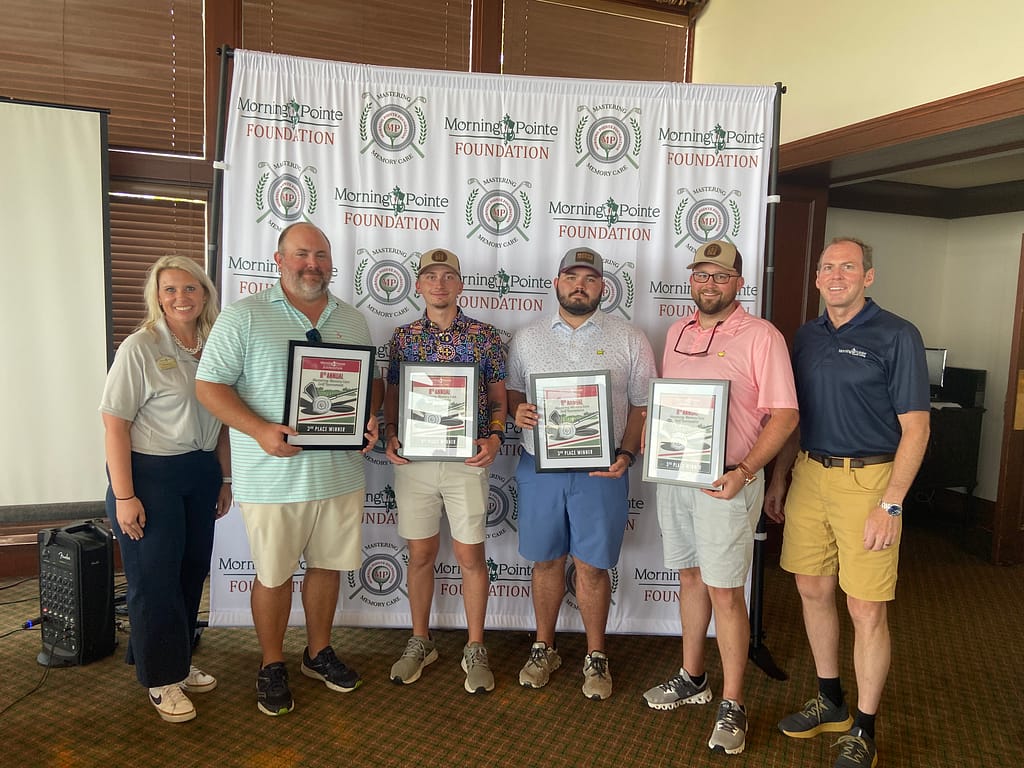 Third-place winners, the Trammell Group, with players (4 in the center) Wade Trammell, Riley Barnes, Korey Chitwood and Chase Deck